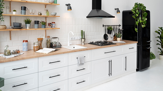 What furniture and solutions will work best in a one-wall kitchen connected to the living room?